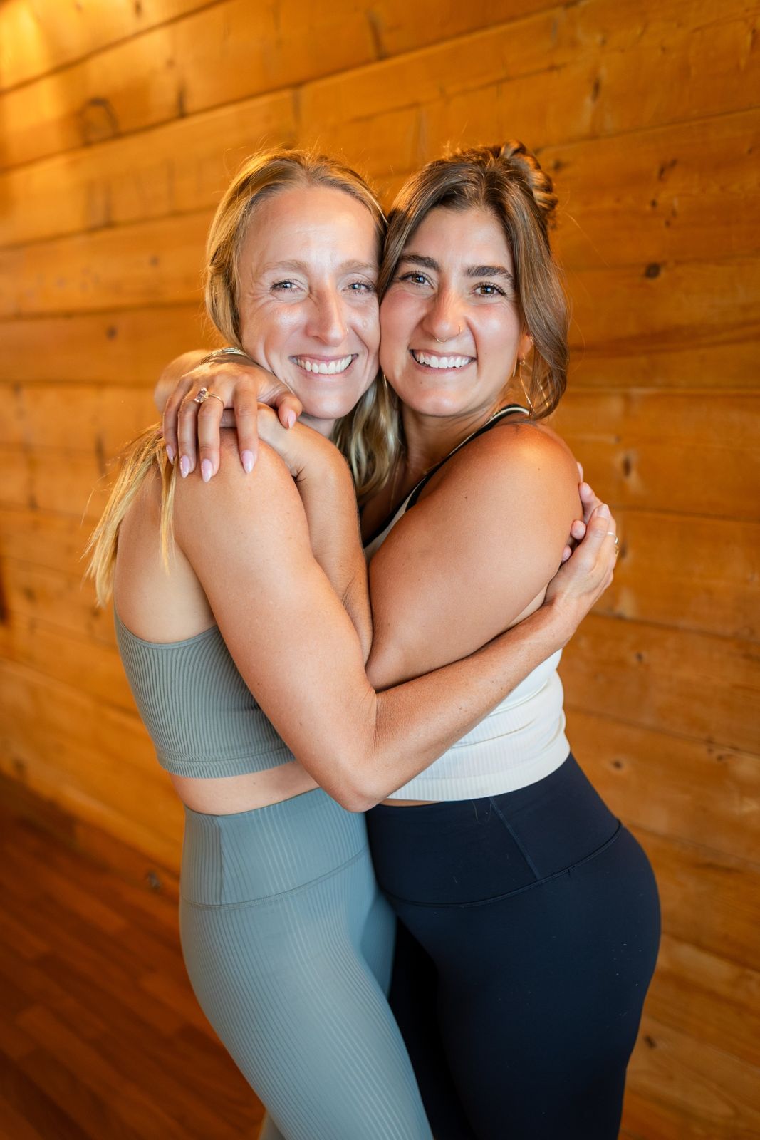 Meg Whitney and Morgan Jaleh Dehmohseni hugging